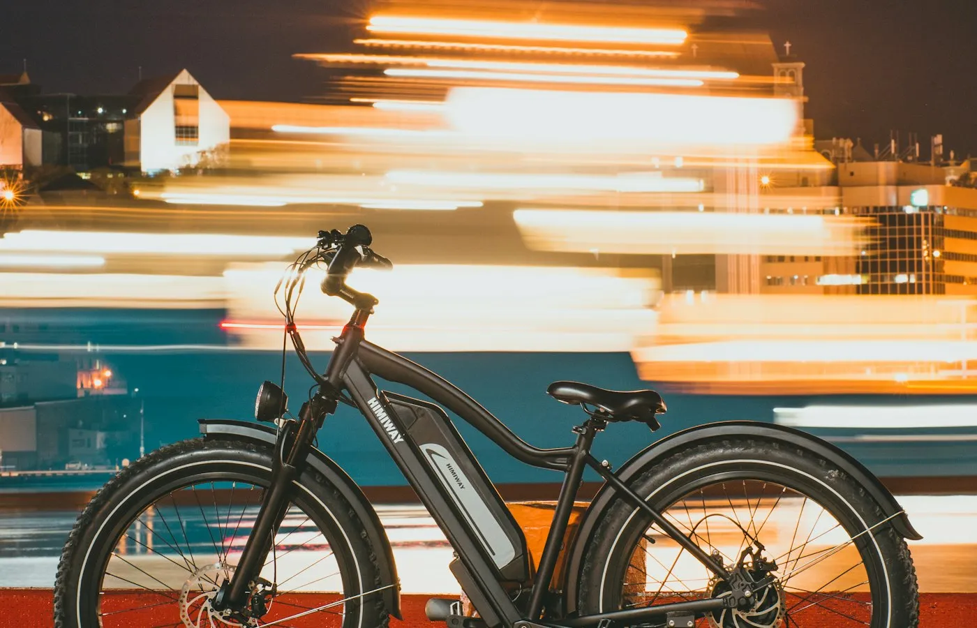 Electric bicycle parked in a city street, battery integrated into the frame